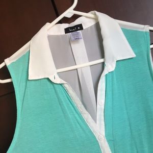 Sheer back sleeveless button down top